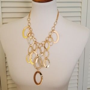 Gold necklace and ear ring set.